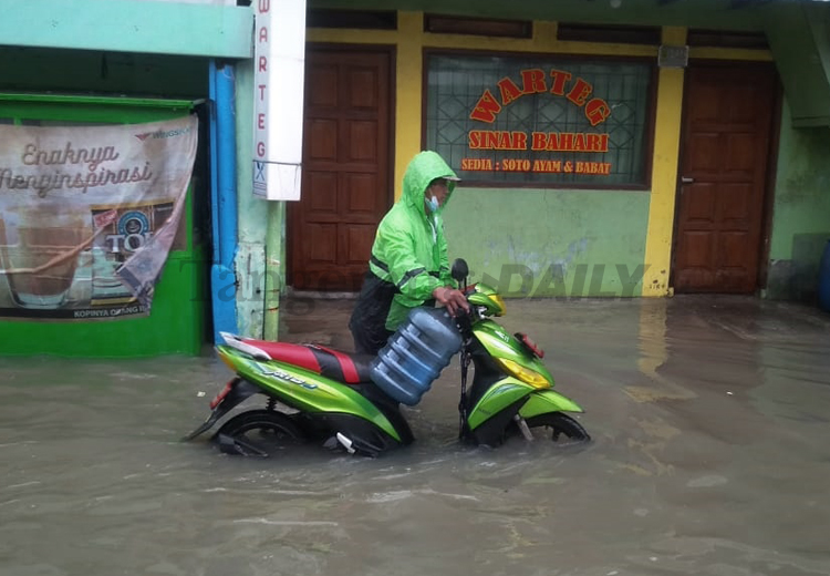 Kali Rawa Bamban Kembali Meluap, Jalan Yos Sudarso Jurumudi Baru Banjir