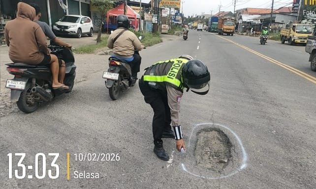 Satlantas Polresta Tangerang memetakan jalan berlubang di jalur mudik sebagai persiapan Operasi Ketupat Maung 2026.