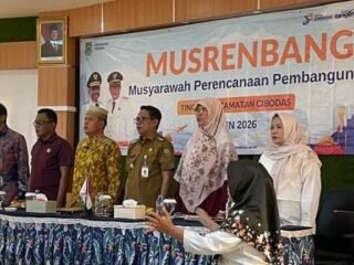 Anggota Komisi III DPRD Kota Tangerang, Anggiat Sitohang, saat menghadiri Musrenbang Kecamatan Cibodas dan menekankan pentingnya pemerataan pembangunan hingga tingkat RT/RW.